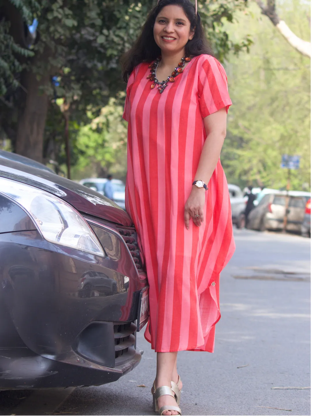 Asymmetrical dress in red and pink stripe cotton blend