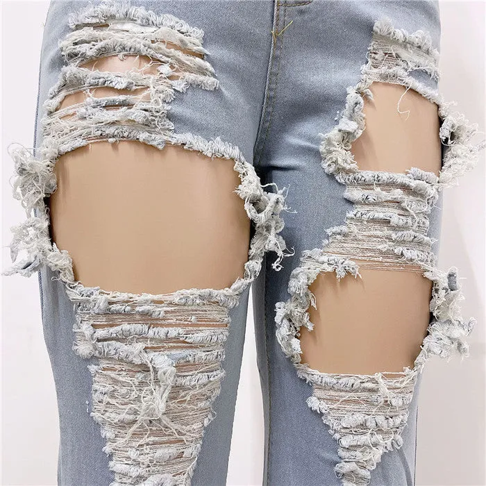 Ripped blue bell bottom jeans